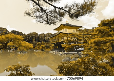 Famous Golden Pavilion Kinkaku-ji in Kyoto Japan and its surrounding beautiful park. To enhance the stress of gold, the whole photo is converted to the golden tint.