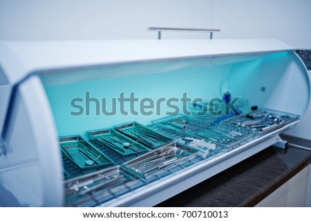 Close-up photo of a wide range of dental instrument in a special container.
