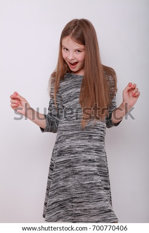 Joyful european teen girl as a fashion model