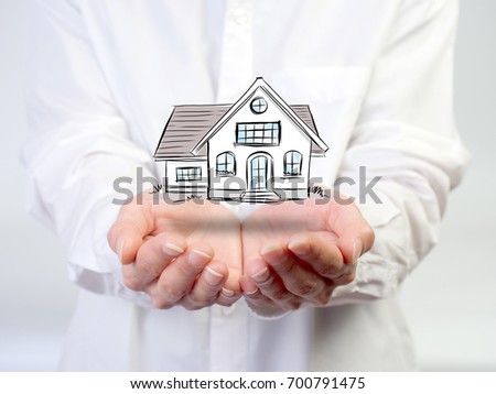 The Architecture, building, house,home,construction, real estate and property concept - close up of hands holding house or home model.Draw house cartoon style. 