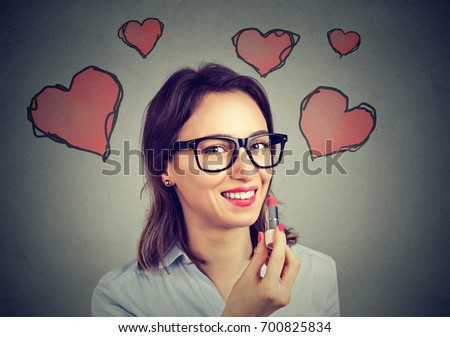 Young woman in love with red lipstick  