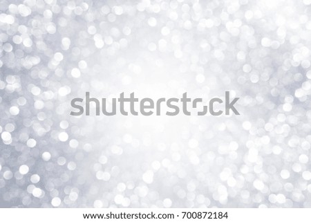 Abstract silver light bokeh background, festive season concept background