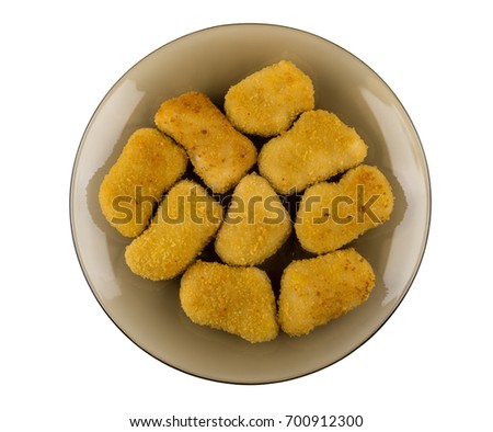 Chicken nuggets in brown plate isolated on white background. Top view