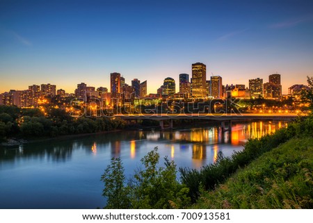 Edmonton downtown, James Macdonald Bridge and the Saskatchewan River at night, Alberta, Canada. Long exposure. Royalty-Free Stock Photo #700913581