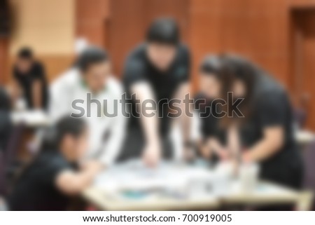 Abstract blurred people conference seminars in meeting room concept of brain storming, defocus
