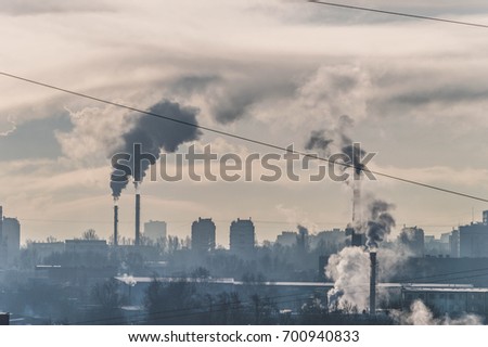 dirty pollution city, pollution pipes in Moscow, Russia Royalty-Free Stock Photo #700940833