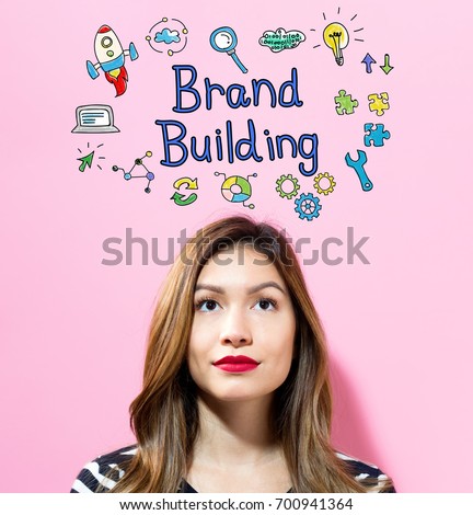 Brand Building text with young woman on a pink background