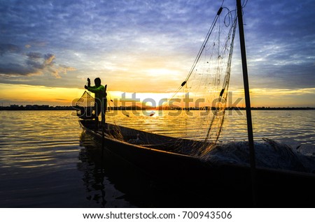Fisherman evening river