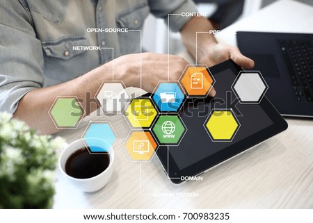 CMS. Content management system applications icons on virtual screen. Business, internet and technology concept.