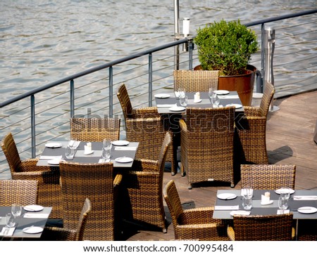 A table in a restaurant is the best place for meetings and negotiations. Cozy table in a cafe. A pleasant atmosphere and delightful aromas. Stock photo.