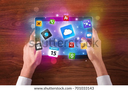 Caucasian business hands holding and working on tablet