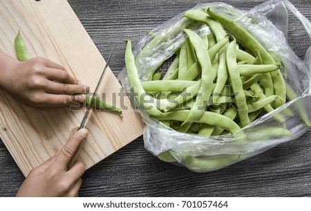 Fresh green beans ready to eat, green bean with knife,