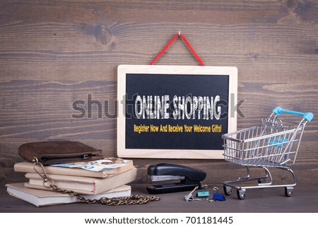 Online shopping concept. Chalkboard on a wooden background