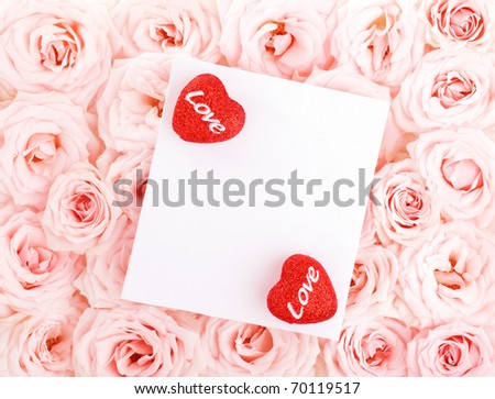Pink fresh roses background with red hearts & isolated  blank greeting card, love concept