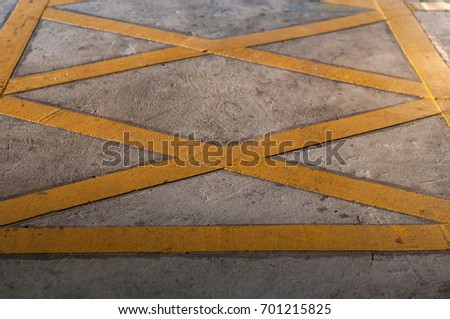 texture of no parking with yellow line on street, shallow depth of field