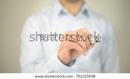 Secret To Success, man writing on transparent screen