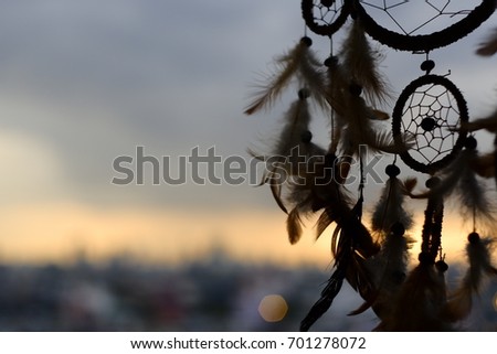 dreamcatcher and sunset background selective focus and blurry