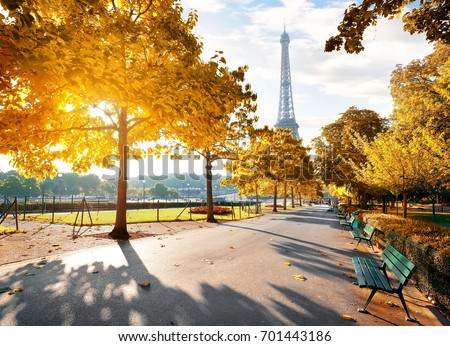 Sunny morning and Eiffel Tower in autumn, Paris, France Royalty-Free Stock Photo #701443186