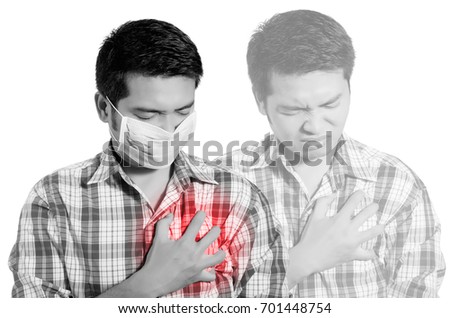 young man holding her chest in pain. monochrome photo with red as a symbol for the hardening. isolated on white background.
