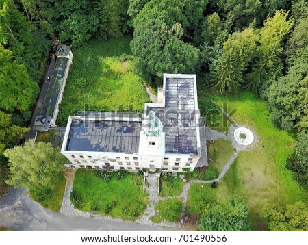 High Angle VIew on a Old Castle in a Forest captured with a Drone. Nearly Wandlitz/Germany