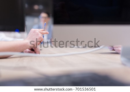 young businessman hand using pen closeup shot