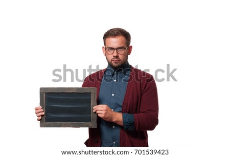 Business man holding blank chalkboard