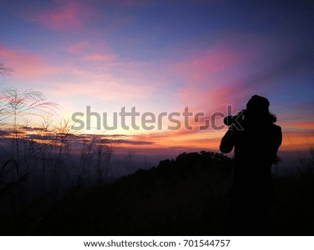 photographer take sunset
