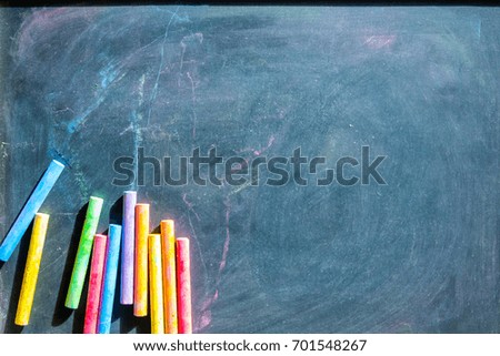 Chalkboard with colorful chalk background. Concept for education, advertising and business. Black chalkboard. 