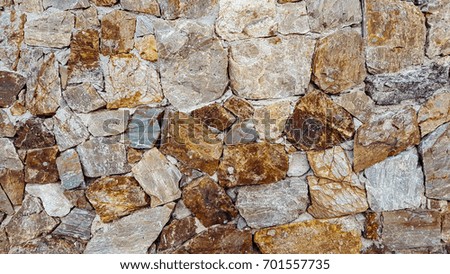 Brown Stone wall background.