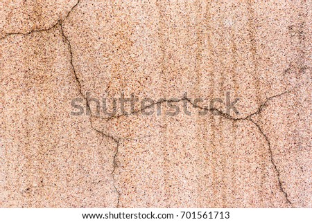 Abstract Yellow stone wall texture and background