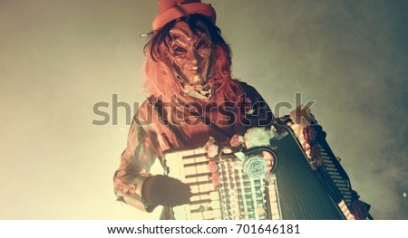 Venetian carnival accordion player 