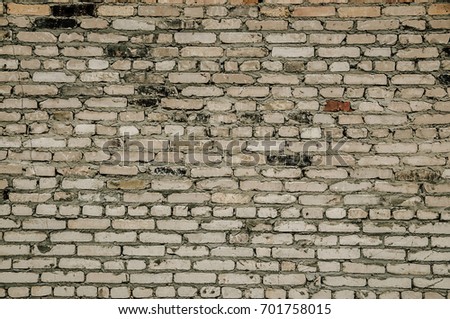 Brick wall background, gray briks texture, damaged wall footage, development fon, strong large cement wall pattern Royalty-Free Stock Photo #701758015