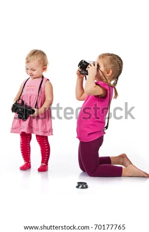 Children playing as photographers isolated on white