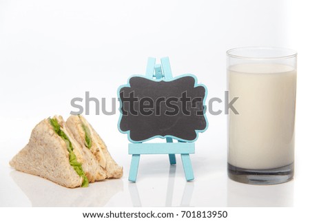 sandwich, blackboard and a glass of milk, healthy food concept
