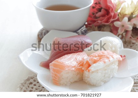 Japanese food, sushi on dish with barley tea Royalty-Free Stock Photo #701821927
