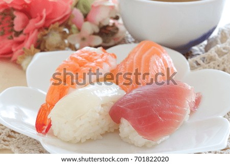 Japanese food, sushi on dish with barley tea Royalty-Free Stock Photo #701822020