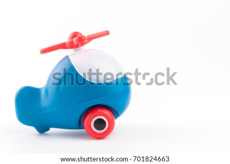 blue toy helicopter,Cartoon toy chopper isolated on white baclground