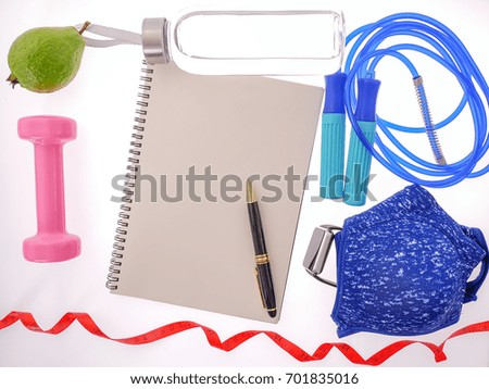 Sports Equipment with copy space on blank notebook for Presentations and Web Design. Space for Text Composition art image, website, magazine or graphic for campaign fitness designs
