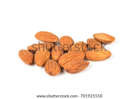 Closeup of almonds, isolated on the white background.