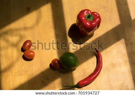 Colorful of fresh fruits and vegetable on wooden table.chili, lime, tomatoes, Cabbage, kiwi, , multi healthy fruits on background. Royalty high quality free stock image.