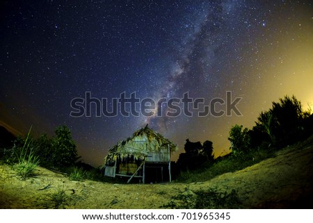 Milkyway over the outdated hut  in the  middle  of night at Muadzam Shah, Pahang, Malaysia ( Visible noise due to high ISO, soft focus, shallow DOF, slight motion blur)