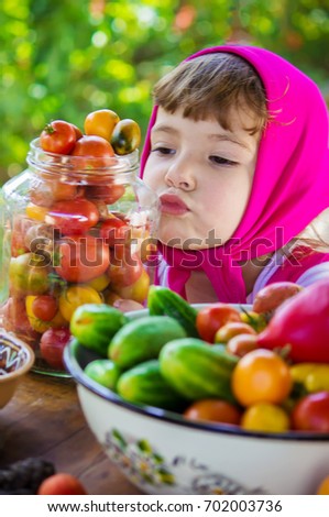 Child and vegetables. Selective focus. 