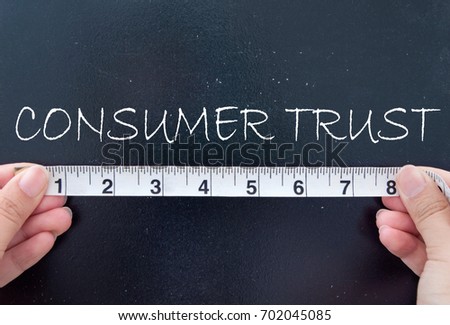 Measuring consumer trust  Royalty-Free Stock Photo #702045085
