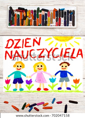 Photo of  colorful drawing: Polish words TEACHER'S DAY and happy children. 