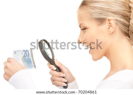 lovely woman with magnifying glass and money