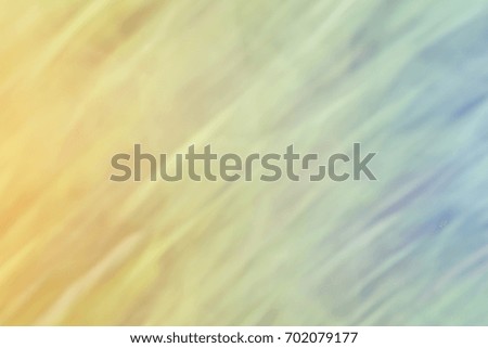 The background pattern is light blue, gold, blurred, beautiful nature.