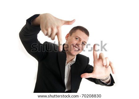 a young businessman framing his face with his hands