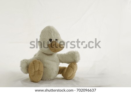 stuffed animal duck on a white background 
