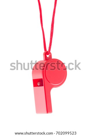 Red plastic whistle on a white background  Royalty-Free Stock Photo #702099523