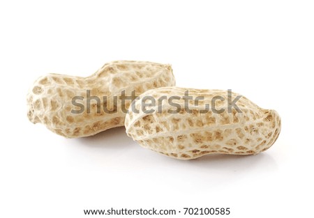 peanuts close up isolated on white background .
